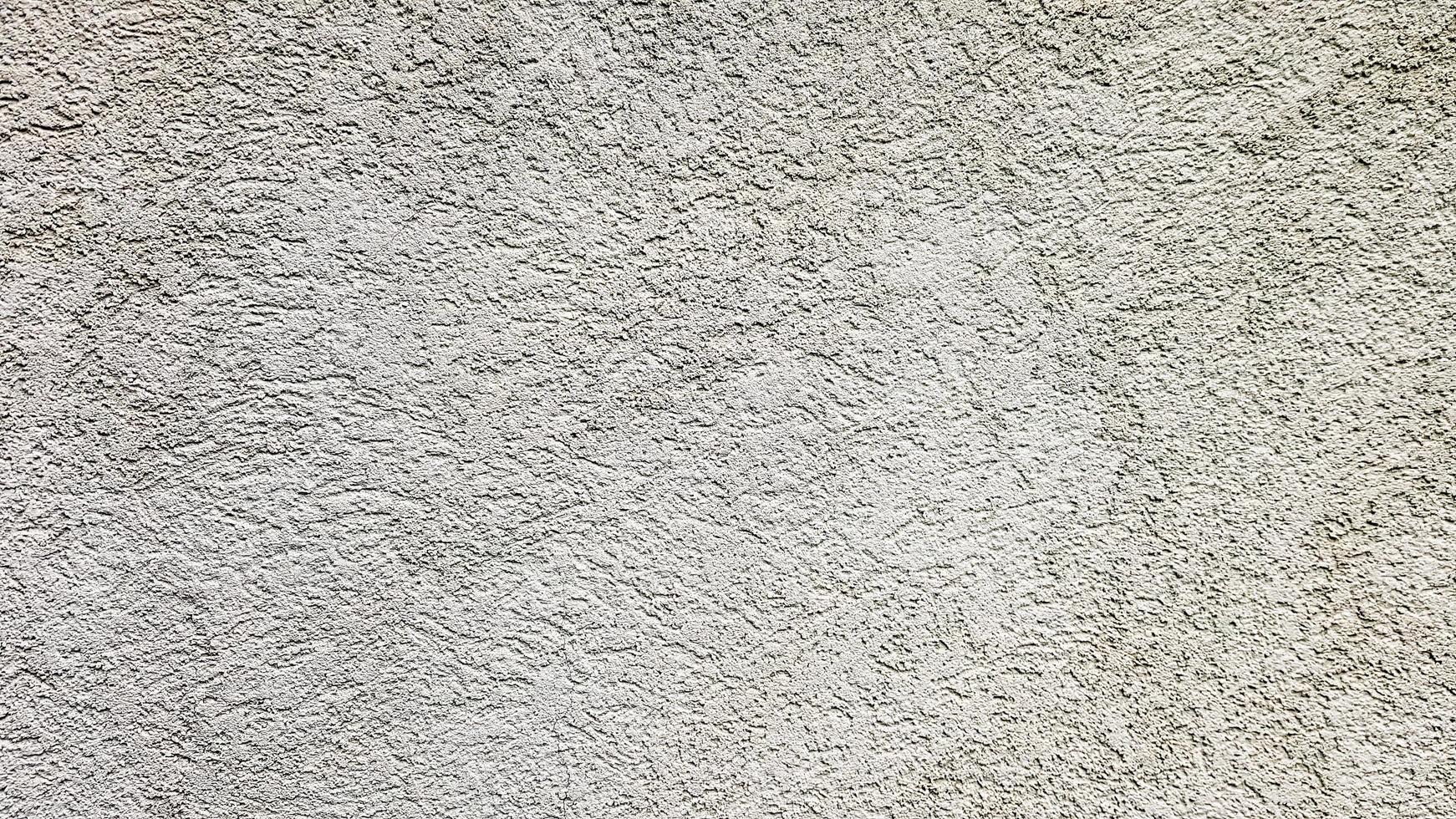 betonnen muur textuur. witte gepleisterde muur achtergrond. wit geschilderde cementmuur. witte betonnen muur en vloer als achtergrondstructuur. loft in de stijl van ontwerpideeën van een woongebouw. foto