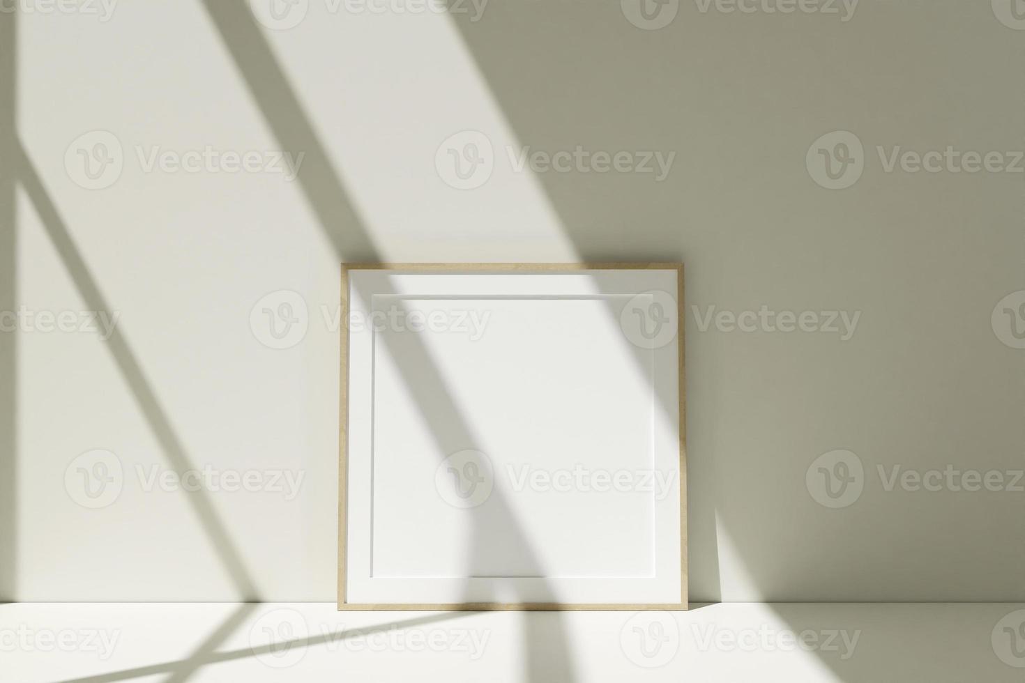 vierkante houten fotolijsten mockup op de vloer leunend tegen de kamermuur met schaduw foto