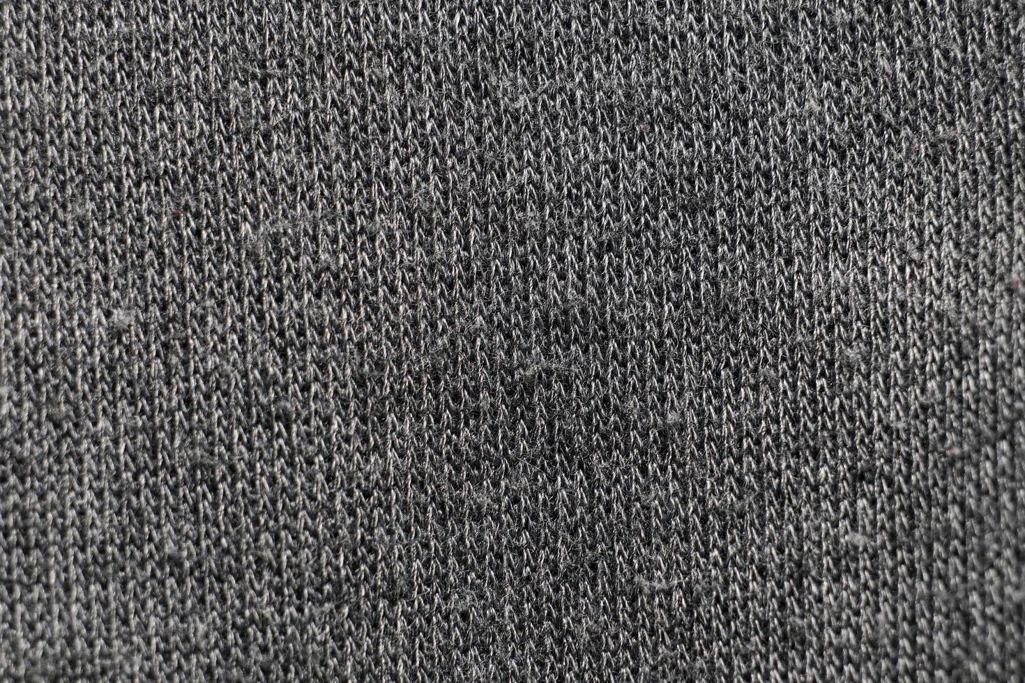 het abstracte oppervlak van harige geweven stof in grijs voor een achtergrondpatroon. foto