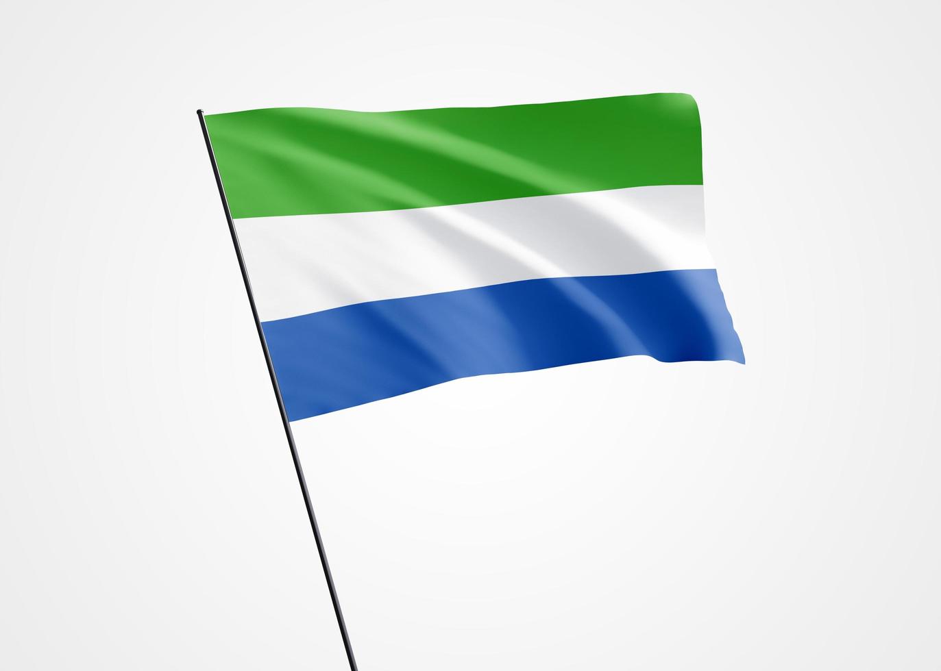 Sierra Leone-vlag die hoog op de witte geïsoleerde achtergrond vliegt. 27 april sierra leone onafhankelijkheidsdag. wereld nationale vlag collectie wereld nationale vlag collectie foto