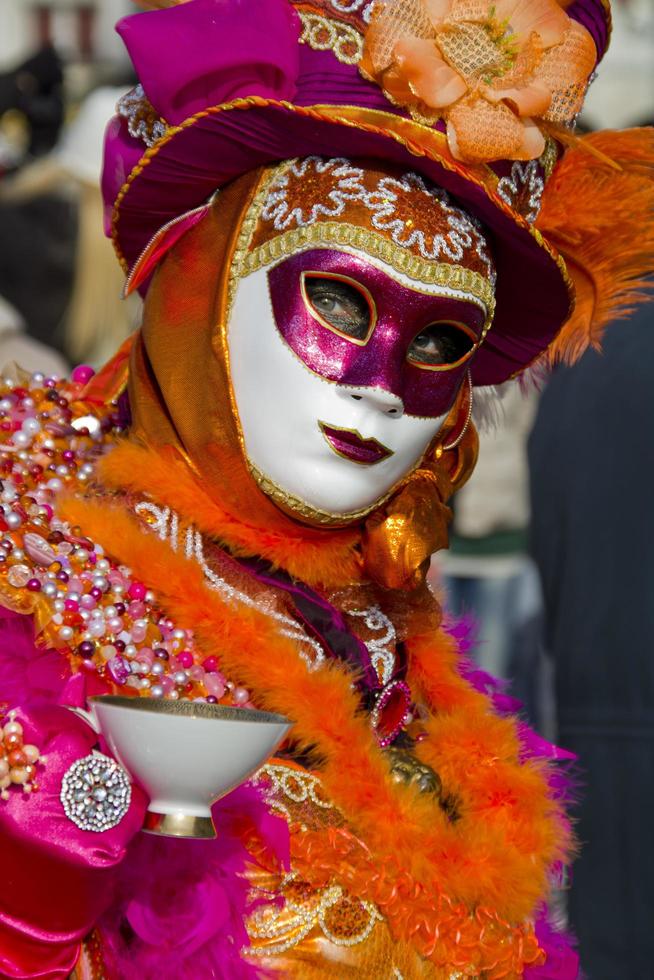 Venetië, Italië 2013 - persoon met Venetiaans carnavalsmasker foto
