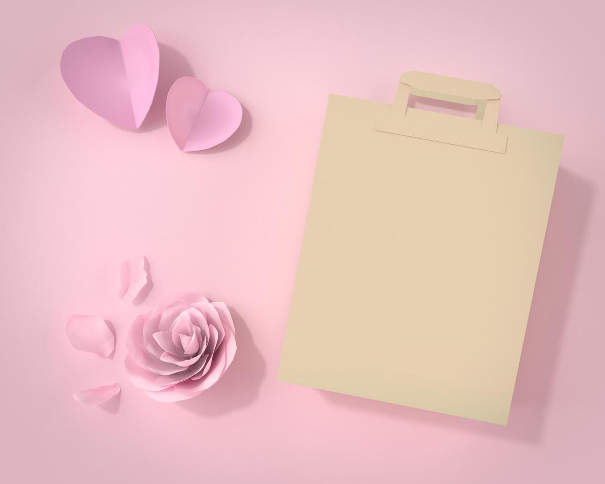 papieren zak om dingen op een roze achtergrond te dragen foto