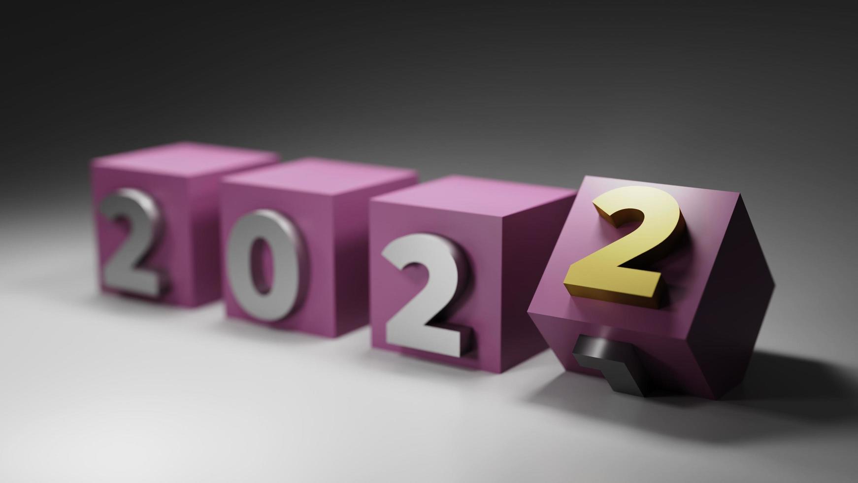 3D-rendering nieuwjaar aftellen 2021 tot 2022 op roze kubus met grijze achtergrond foto