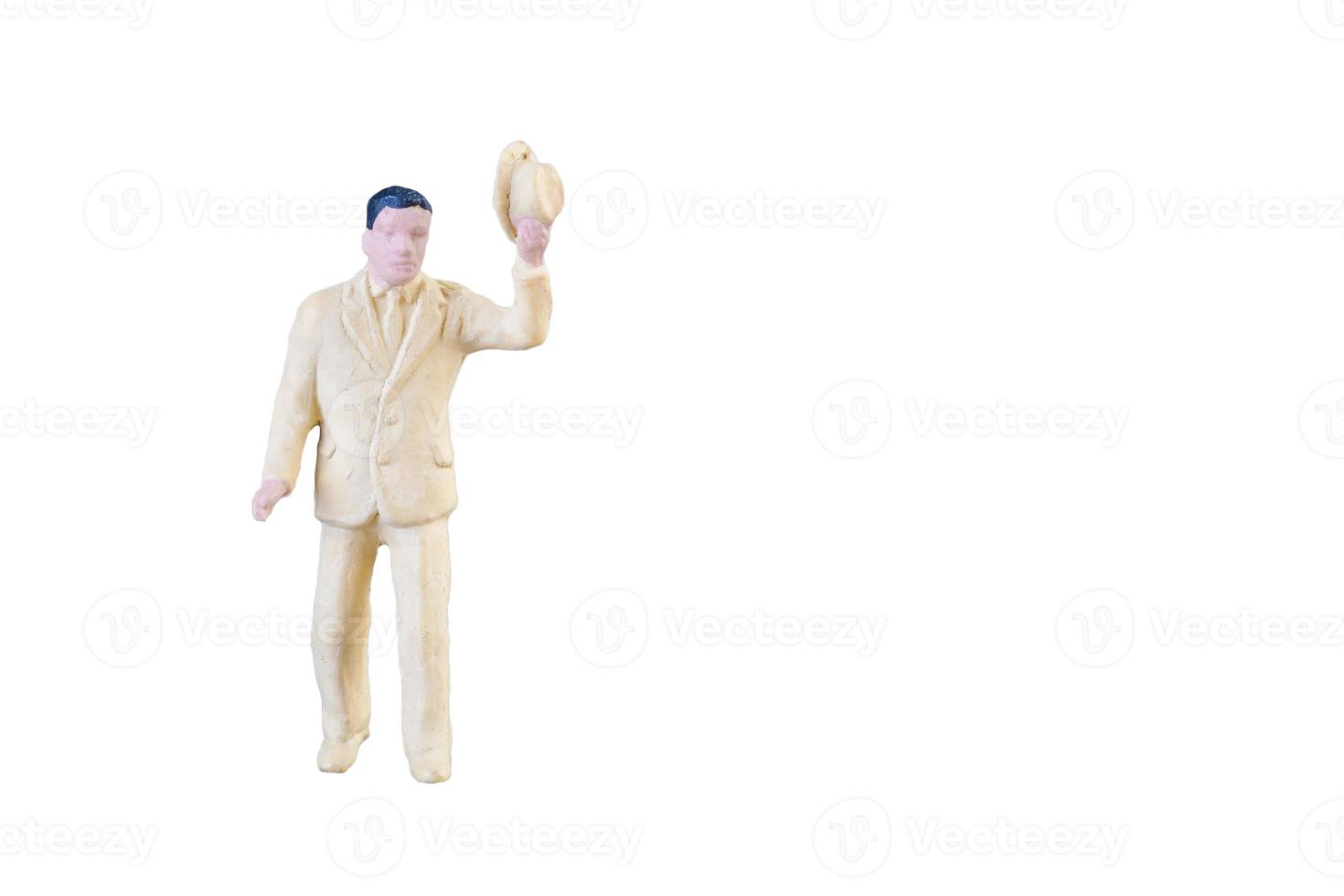 close-up van miniatuur mensen geïsoleerd met uitknippad op een witte achtergrond. foto