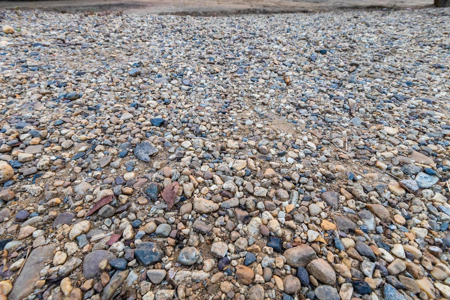 kleurrijke zand- of kiezelsteentextuur. naadloze textuur op grondtextuur. foto