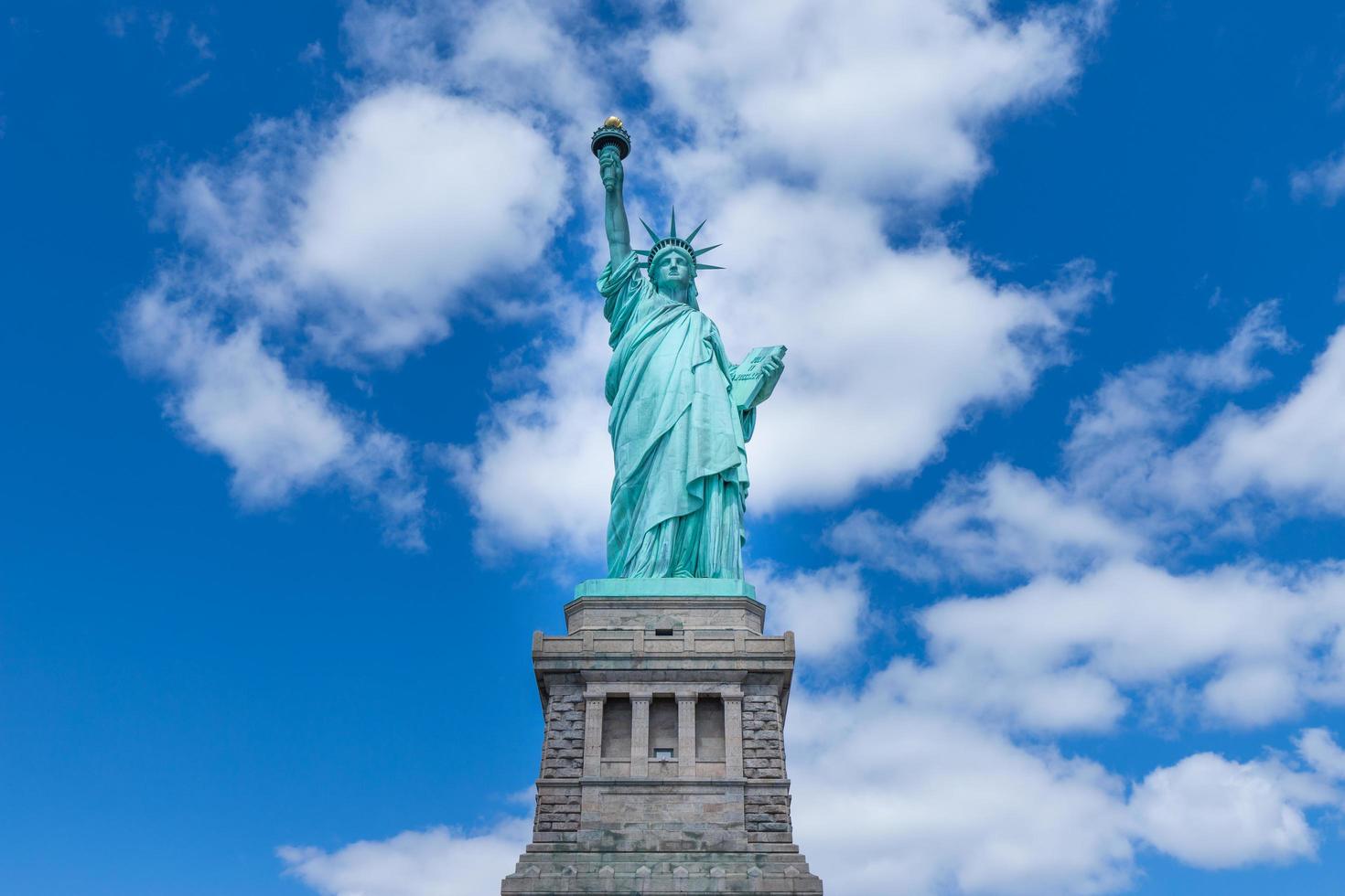 het Vrijheidsbeeld en Manhattan, New York City, Verenigde Staten foto