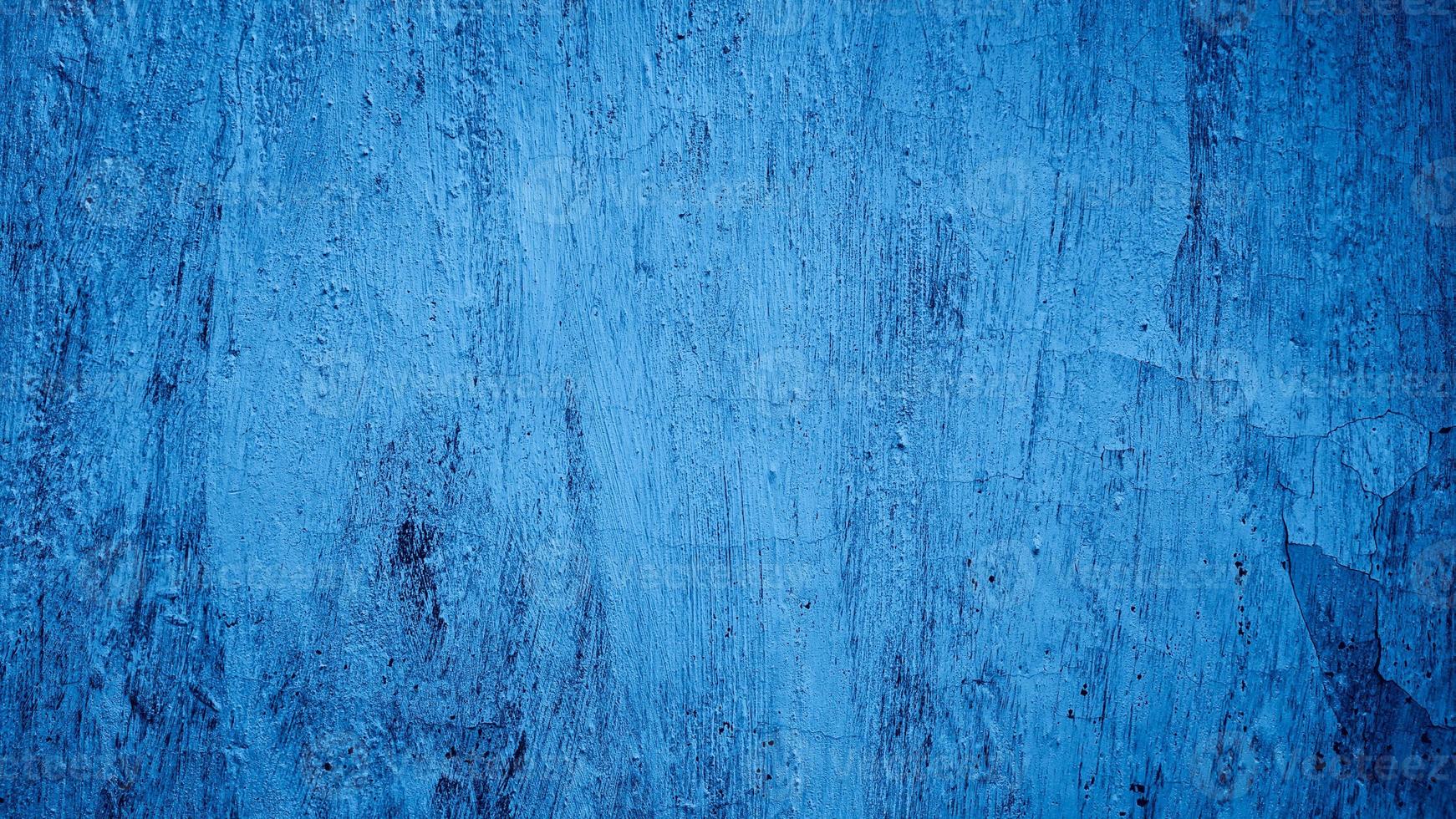 blauwe abstracte gepleisterde cement betonnen muur textuur achtergrond foto