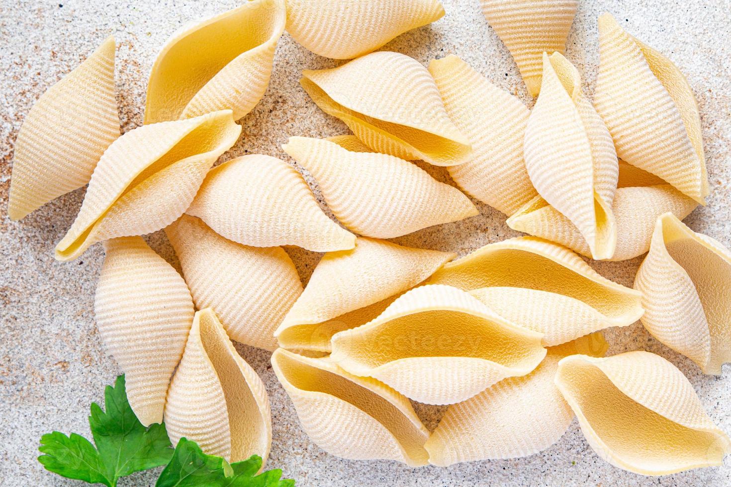 conchiglioni rauwe pasta koninklijke schelpen voedsel achtergrond foto