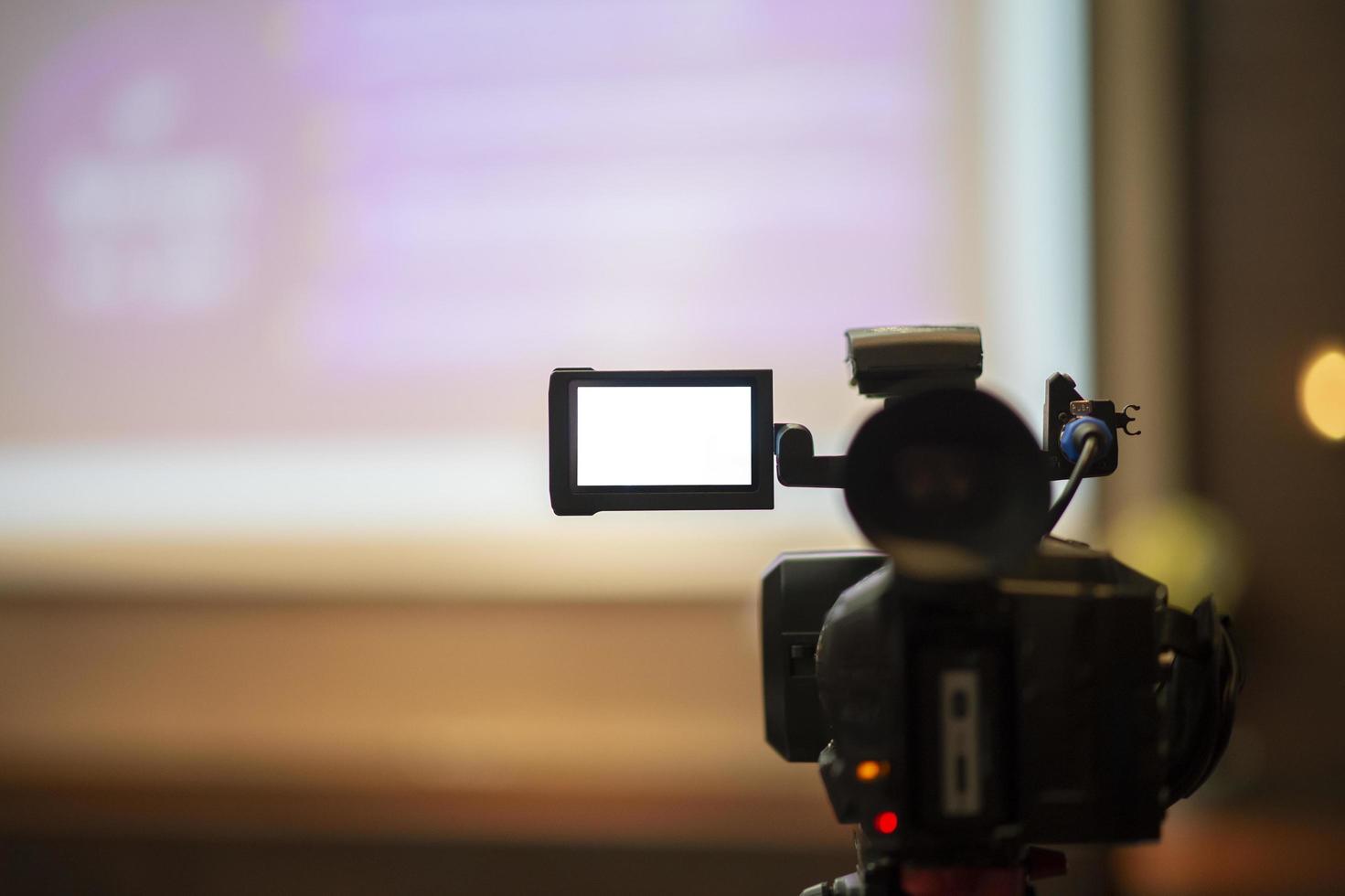 journalisten nemen vergaderingsconferentie op foto