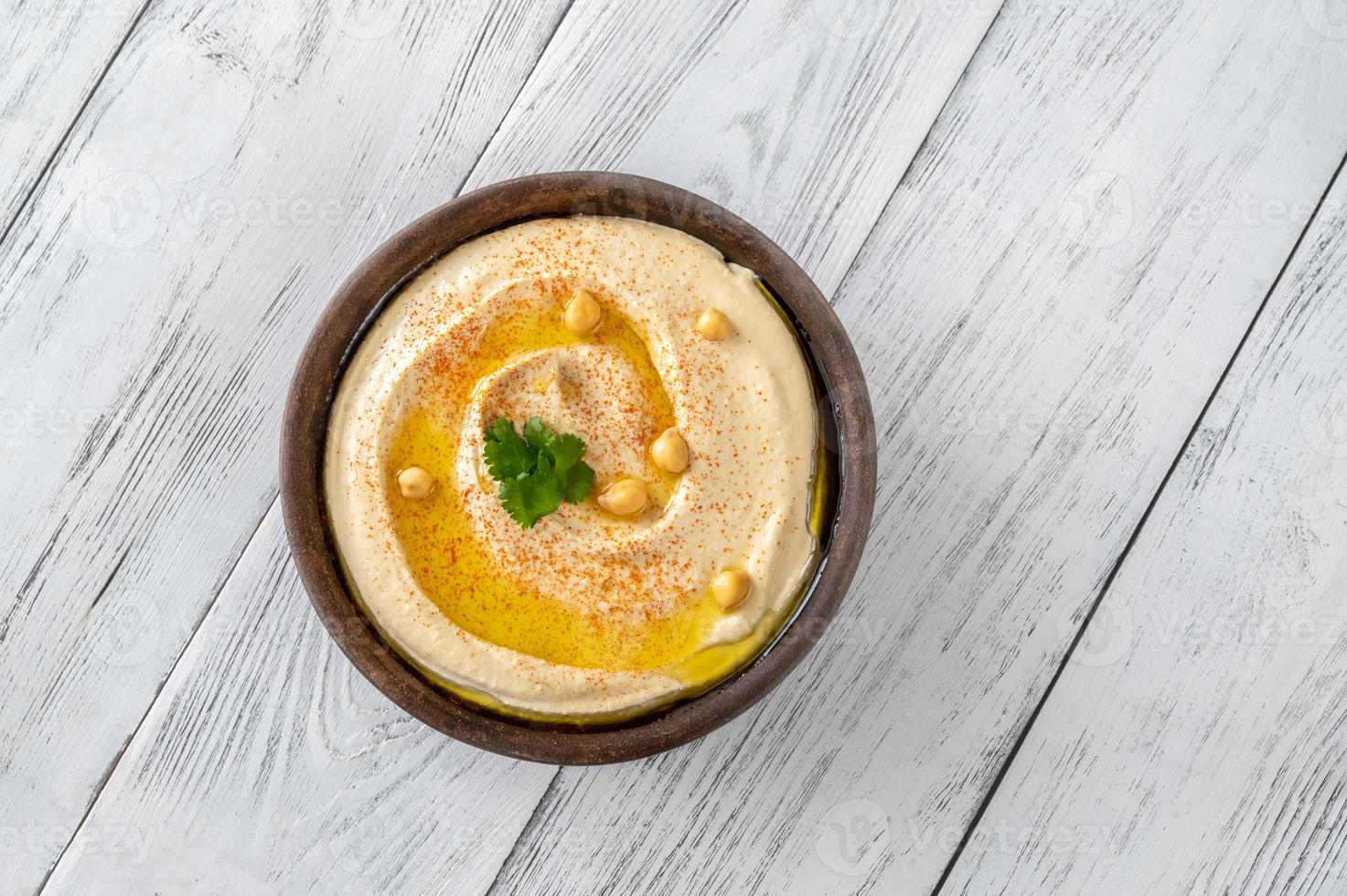 kom met hummus foto