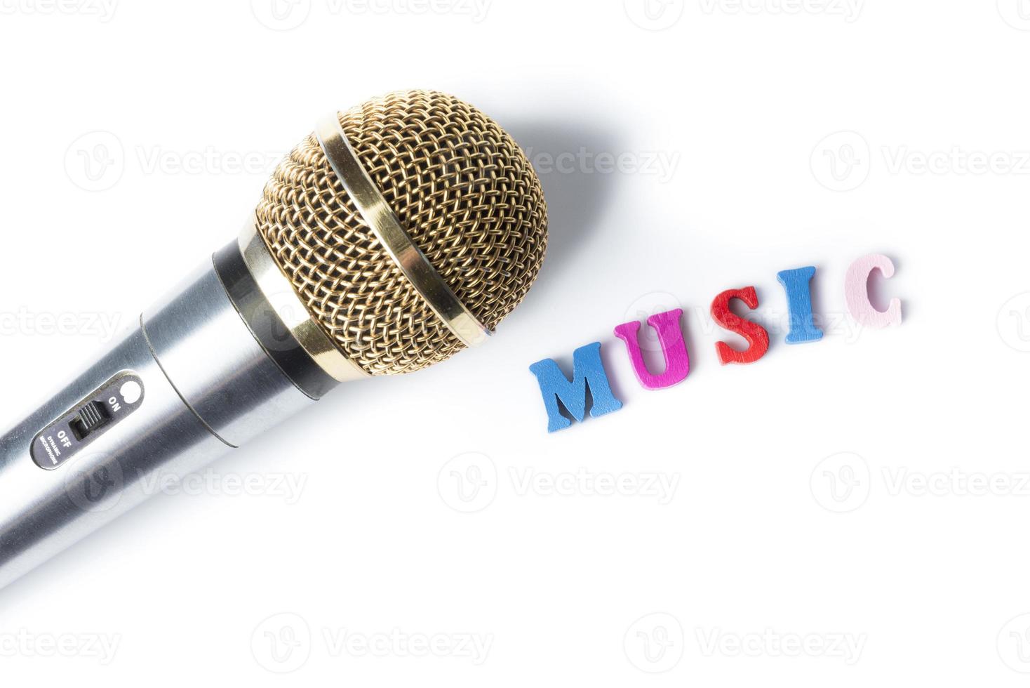 microfoon op een witte achtergrond met woorden muziek foto