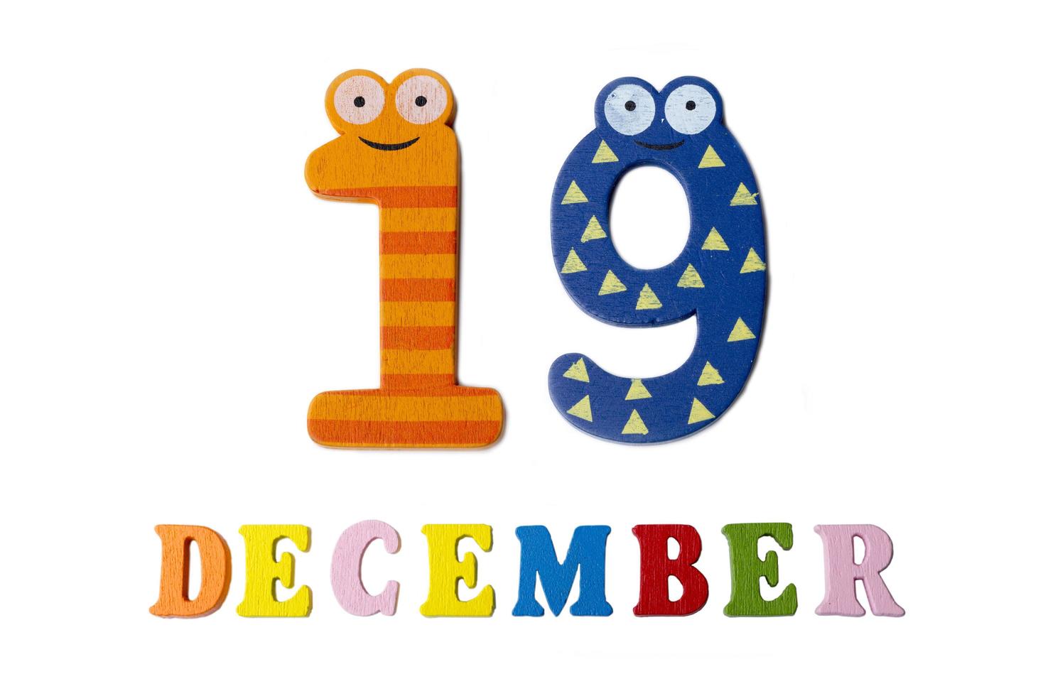 19 december op een witte achtergrond, cijfers en letters. foto