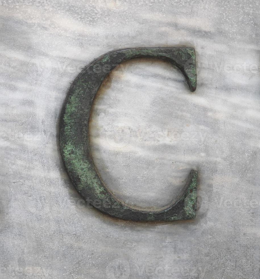 bronzen letter c foto