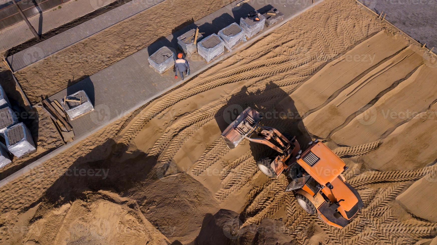 bovenaanzicht van industriële walsmachine geïsoleerde textuur, werken en nieuwe weg maken foto