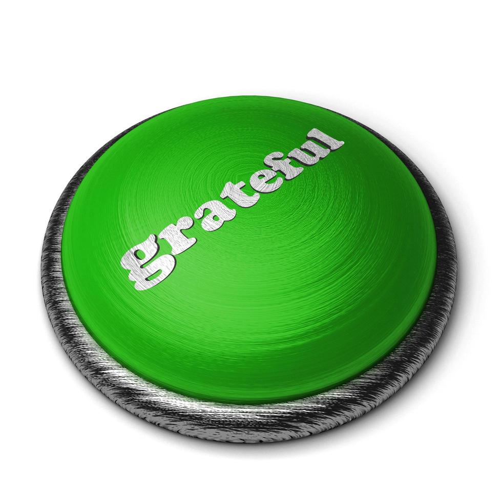 dankbaar woord op groene knop geïsoleerd op wit foto