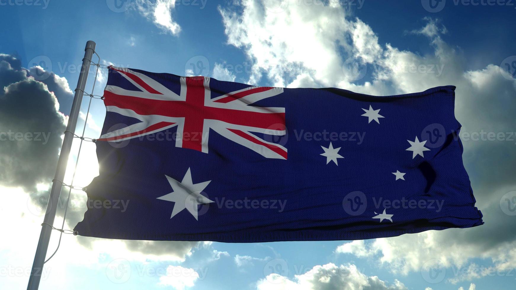 de nationale vlag van australië waait in de wind tegen een blauwe lucht. 3D-rendering foto