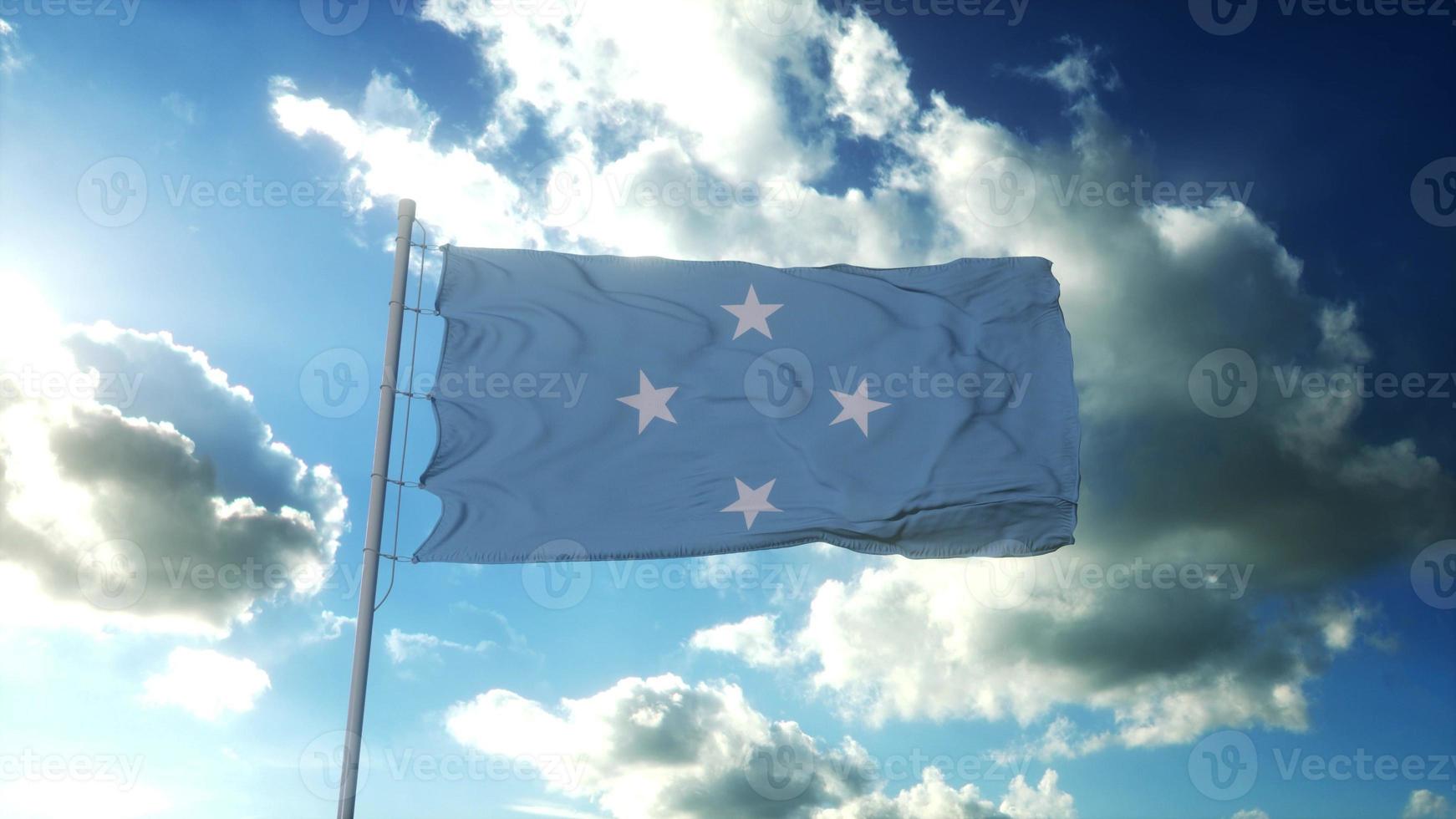 federatieve staat van micronesië vlag zwaaien op wind tegen mooie blauwe hemel. 3D-rendering foto