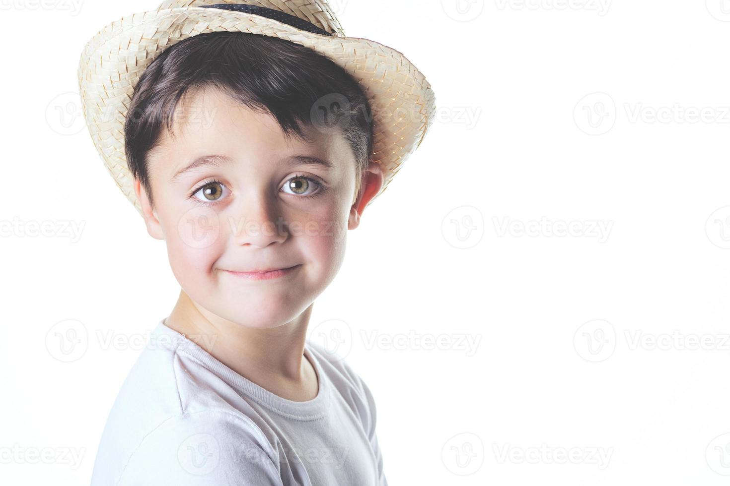 lachend kind met hoed foto