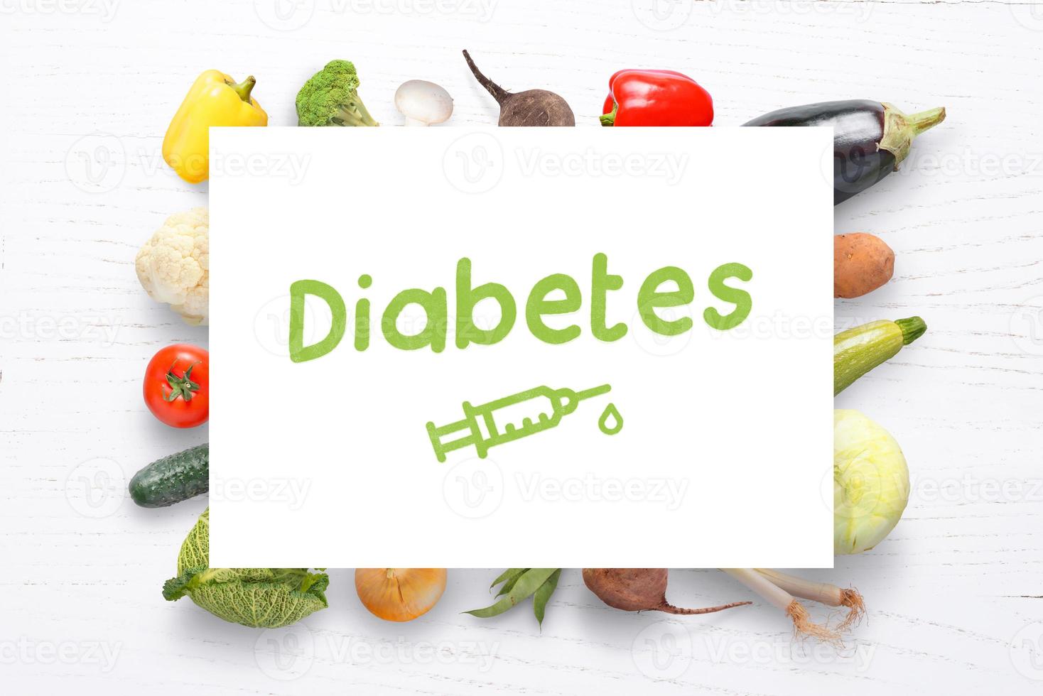 diabetesconcept met dieet en gezond voedsel op bureau. tekening insuline-injectie op papier. wereld diabetes dag concept foto