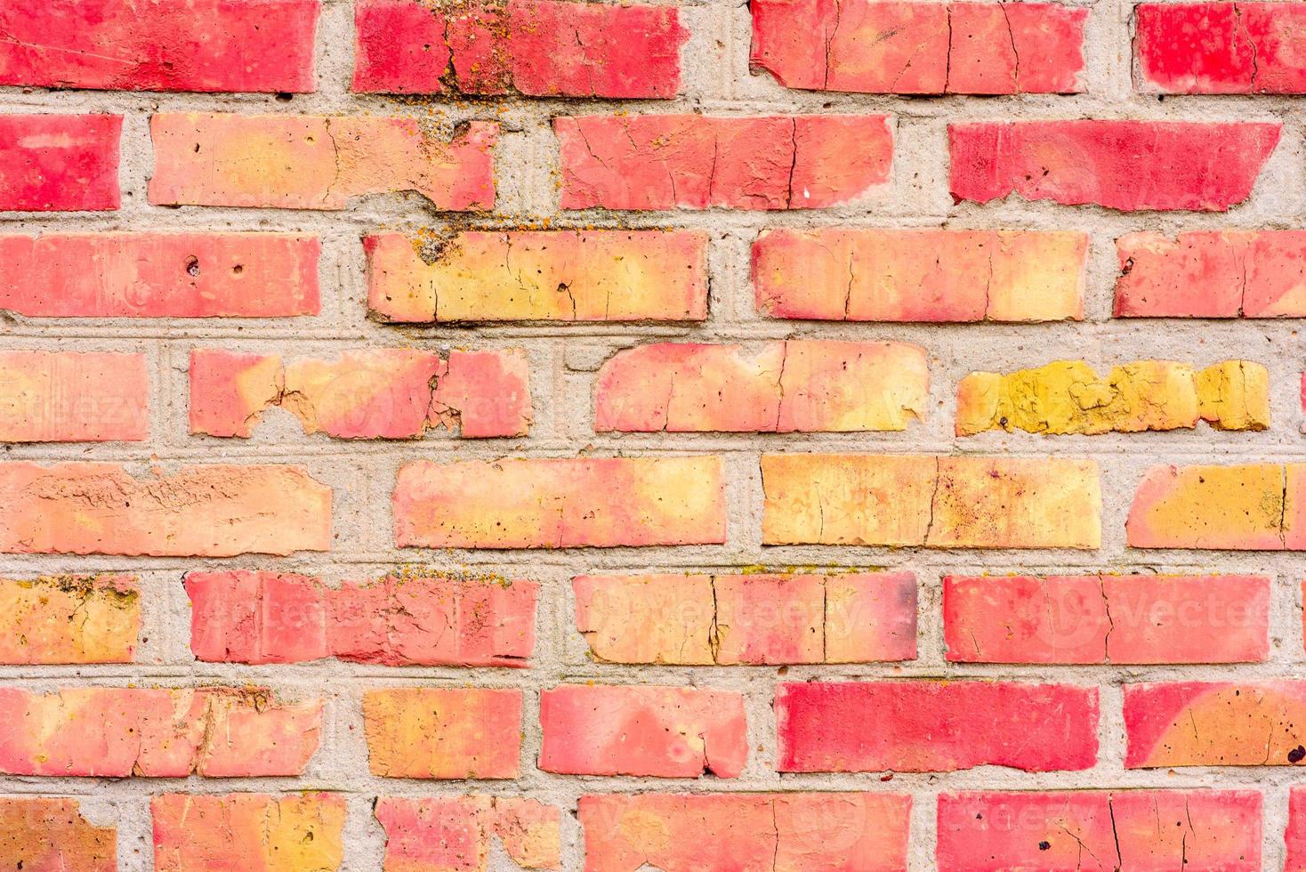 bakstenen muur met oranje baksteen. oranje bakstenen achtergrond foto