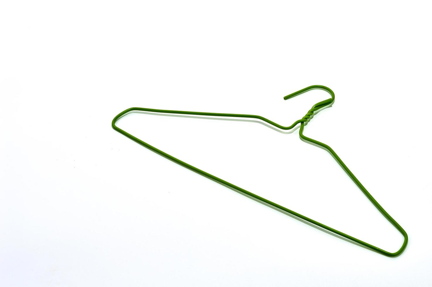 groen hanger-object op een witte achtergrond. foto