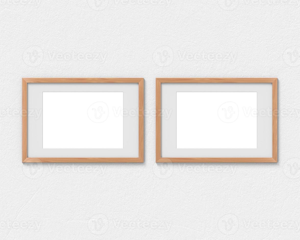 set van 2 horizontale houten frames mockup met een rand aan de muur. lege basis voor afbeelding of tekst. 3D-rendering. foto