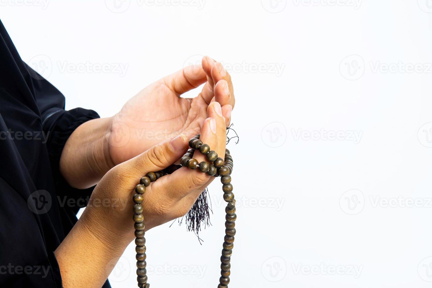 moslimvrouw die bidt voor allah, moslimgod foto