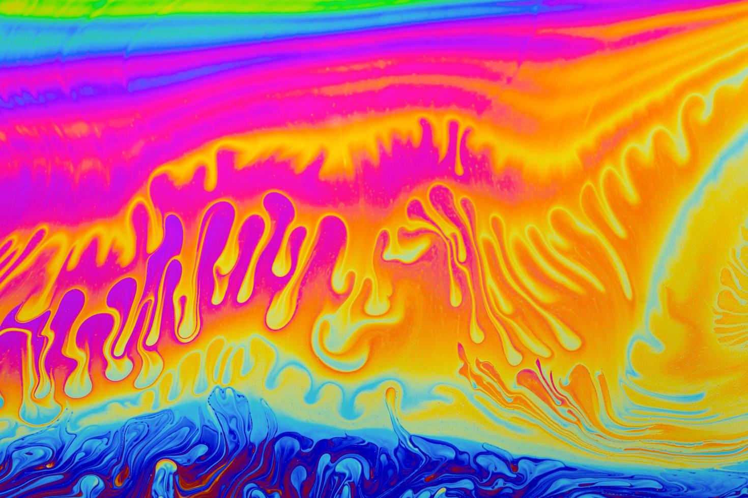 regenboog kleuren. psychedelische multi gekleurde patronen achtergrond. foto macro shot van zeepbellen