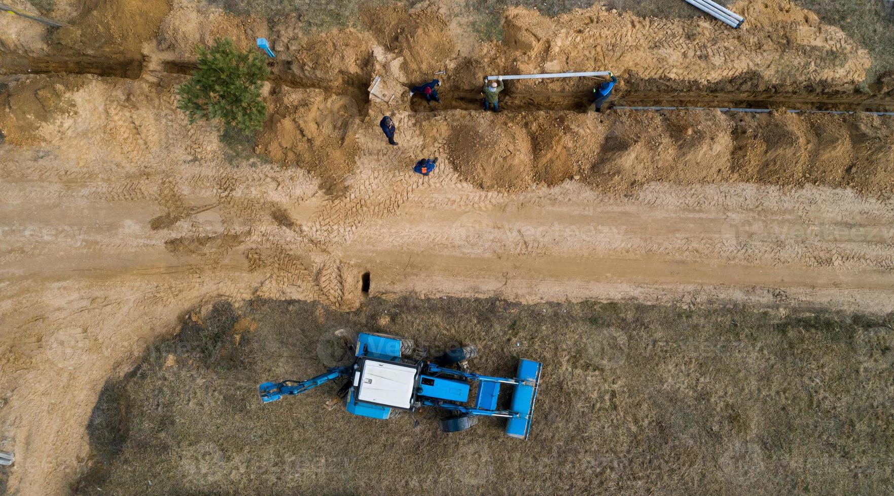 leggen van telefoon- en waterleidingen bovenaanzicht luchtfotografie vanuit een drone foto