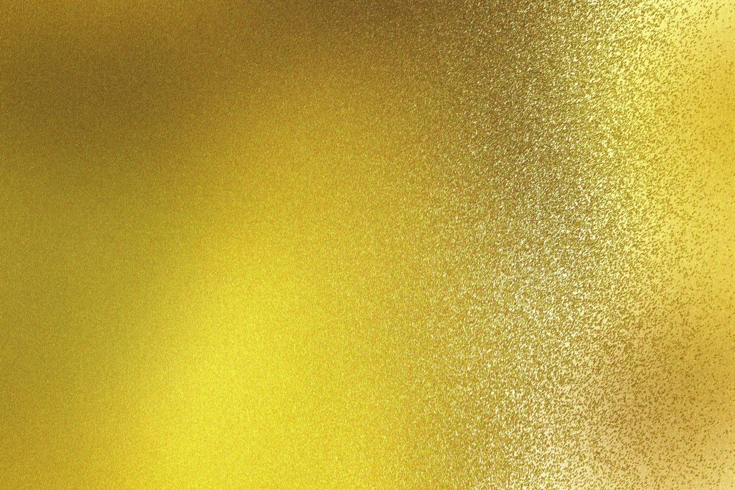 abstracte textuurachtergrond, glanzend op ruwe gouden staalmuur foto