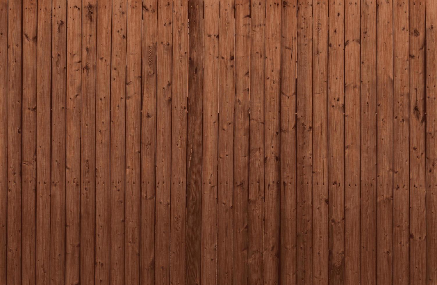 de bruine schuur houten muur. muur textuur achtergrondpatroon. foto