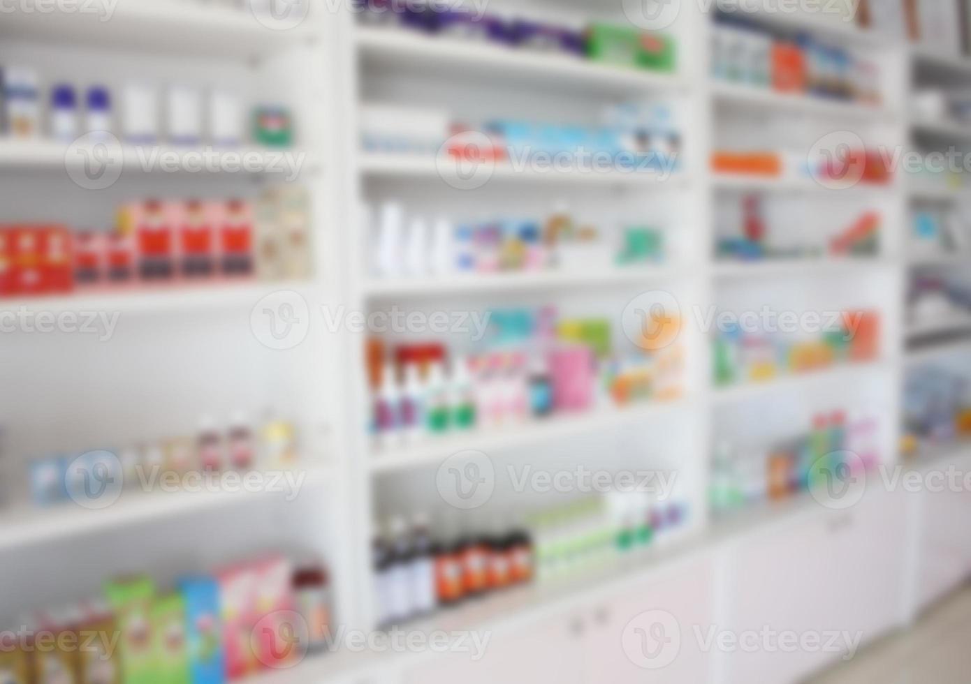 schappen met medicijnen in de apotheek vervagen foto