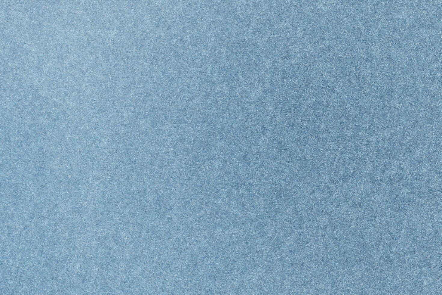 textuur van ruwe lichtblauwe zandwas, detailsteen, abstracte achtergrond foto