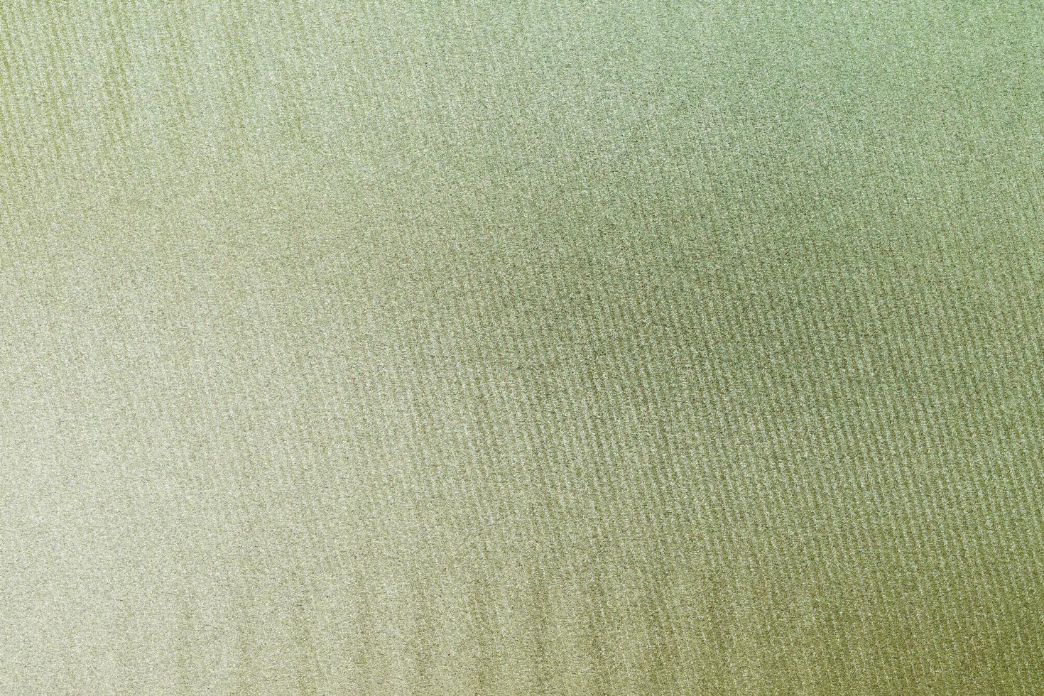 textuur van krassen op oude groene zandwas, detailsteen, abstracte achtergrond foto