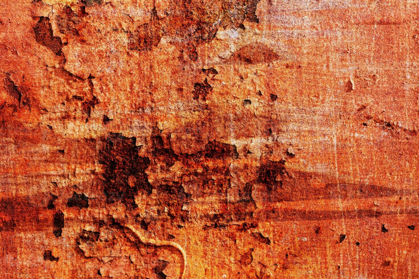 abstracte textuur van roestig metaal. een gebarsten roest metalen muur. achtergrond voor ontwerp foto