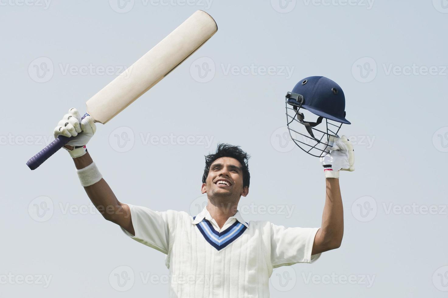 cricket batsman viert zijn succes foto