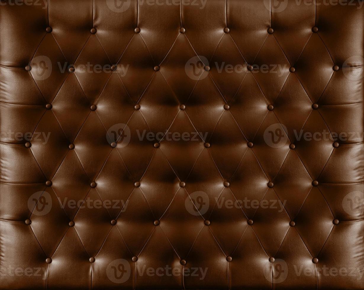 close-up retro chesterfield-stijl, zwarte capitone-textielachtergrond foto