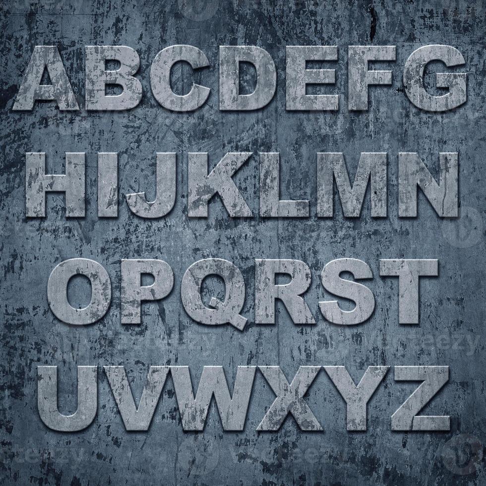 laatstgenoemden van alfabet op grungetextuur foto