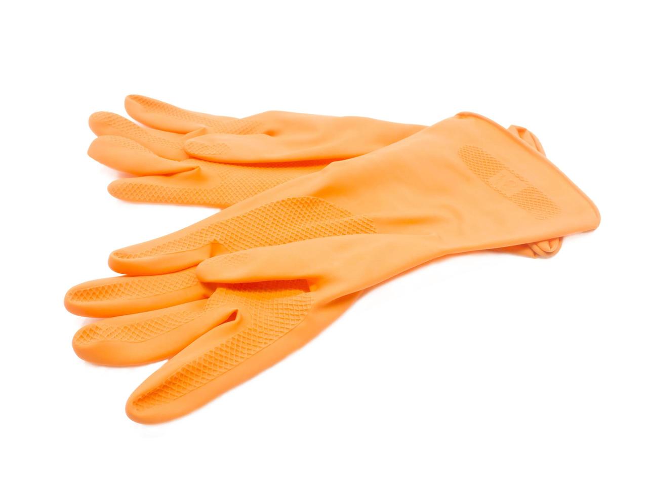 twee oranje rubberen handschoenen. detailopname. geïsoleerd op een witte achtergrond. foto