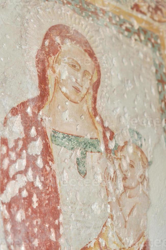 oude fresco schilderen op een muur achtergrond foto