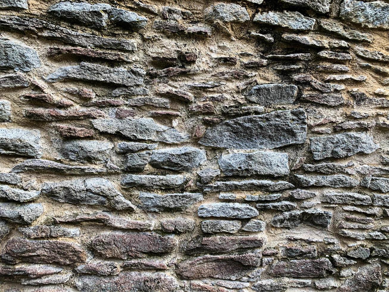oude stenen muur achtergrond. stenen achtergrond foto