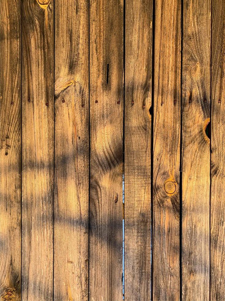 houten muur achtergrond. hek achtergrond. plank gemaakt van hout foto