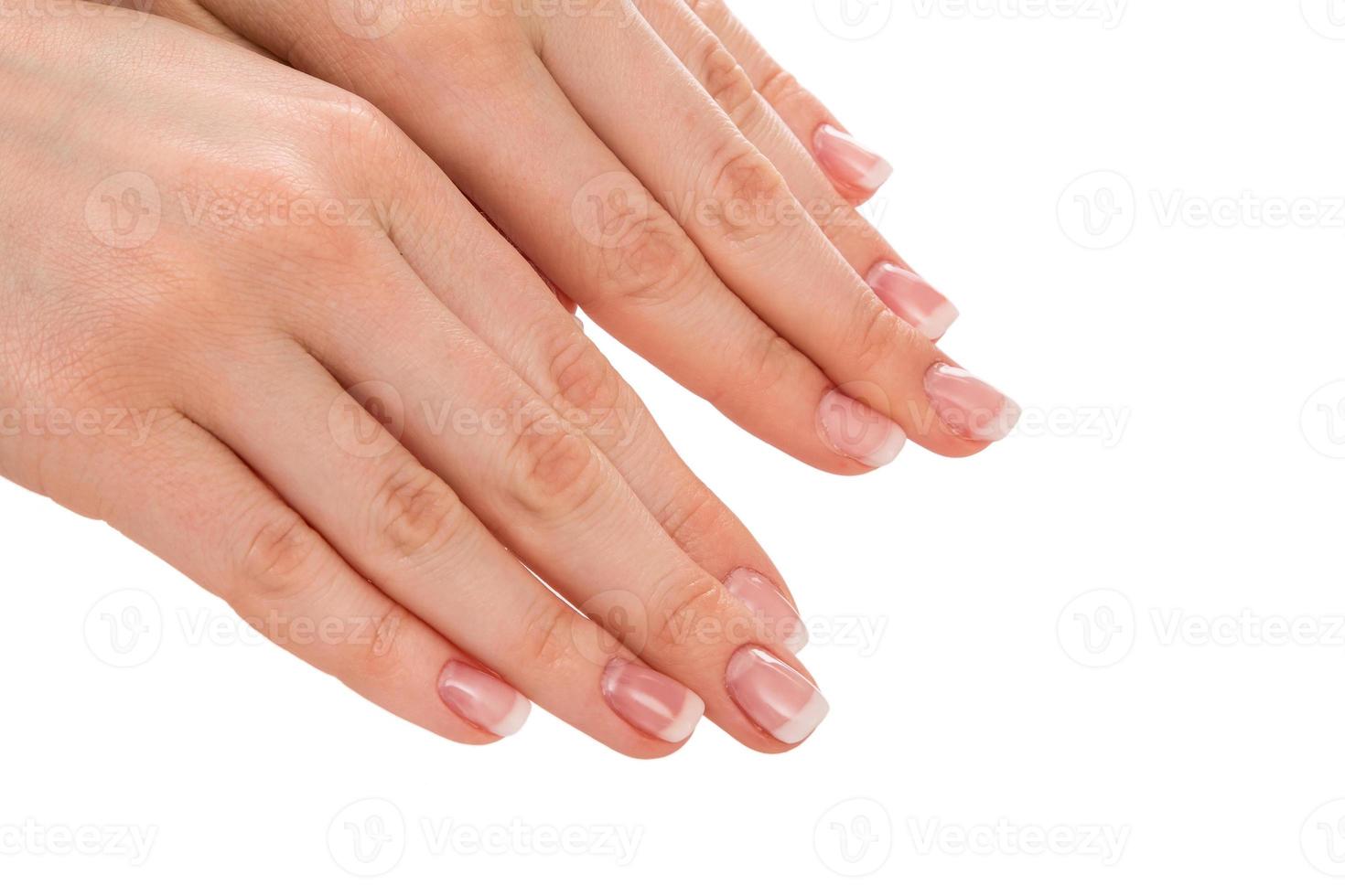 handen met french manicure foto