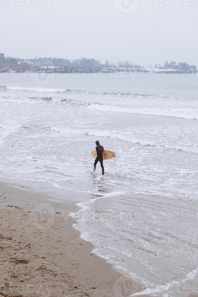 surfer op het strand foto
