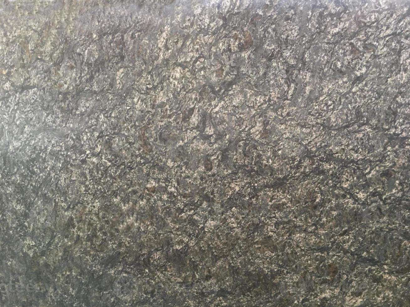 graniet steen donker grijze steen vrije vorm blok baksteen vloer ruw oppervlak textuur rots materiaal muur decoreren achtergrond foto