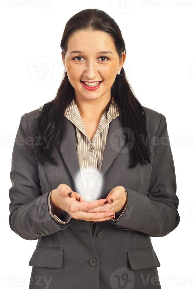 zakenvrouw met gloeilamp foto