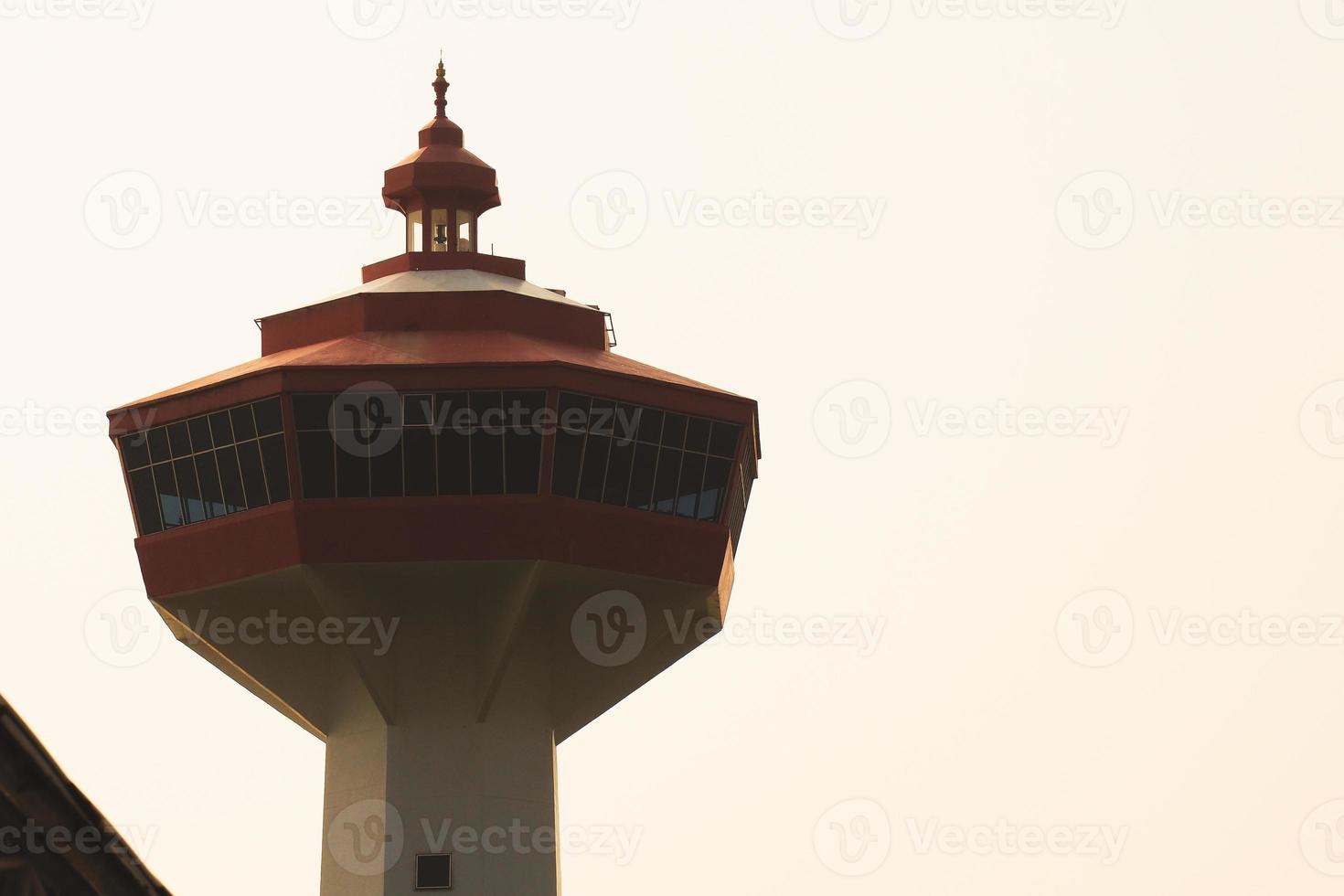 blauwe vuurtoren, uitzicht op de zonsondergang. vuurtoren zonsondergang bij middag uitzicht. Thailand foto