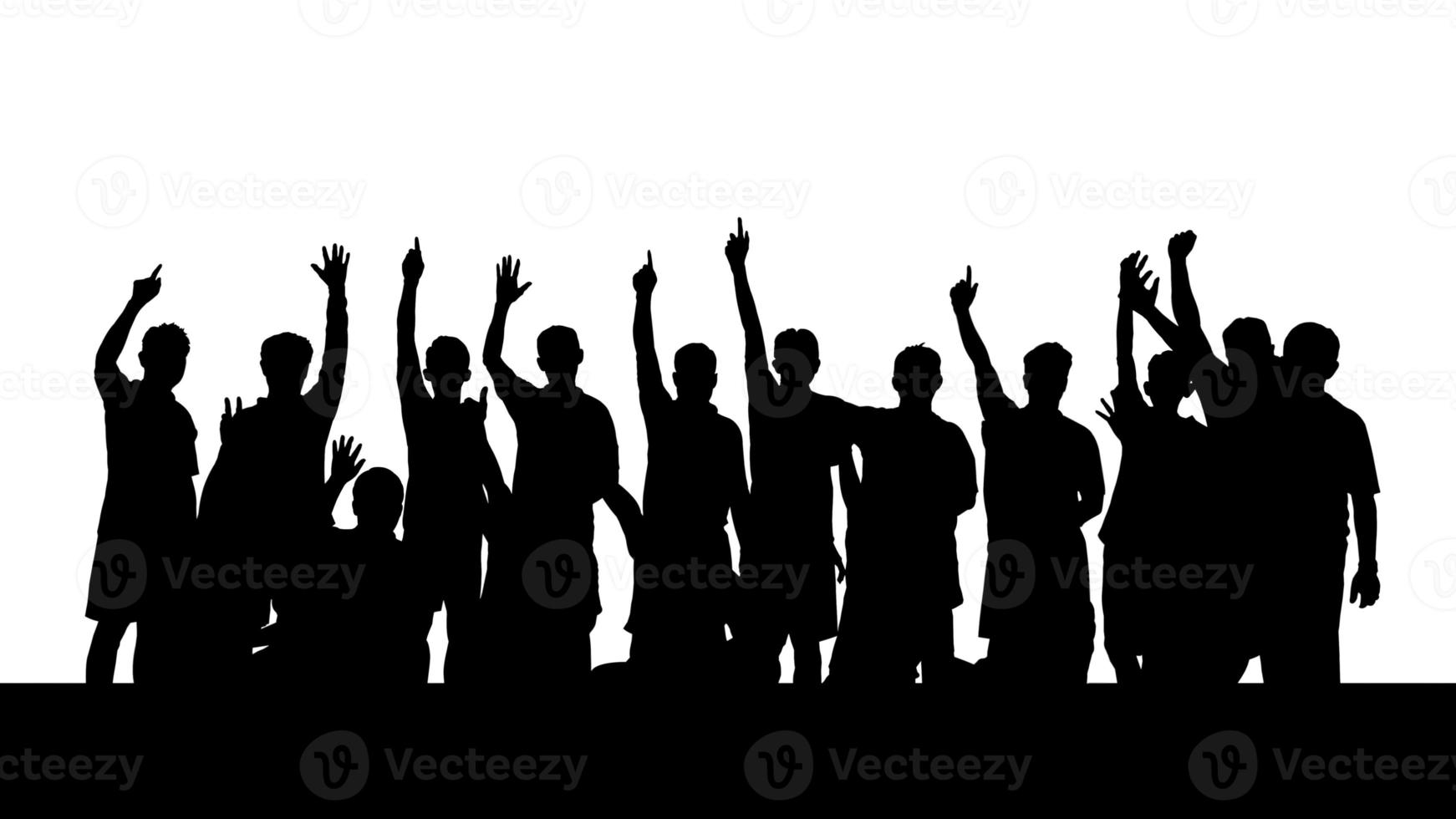 silhouet van mensen staken hun handen op. foto