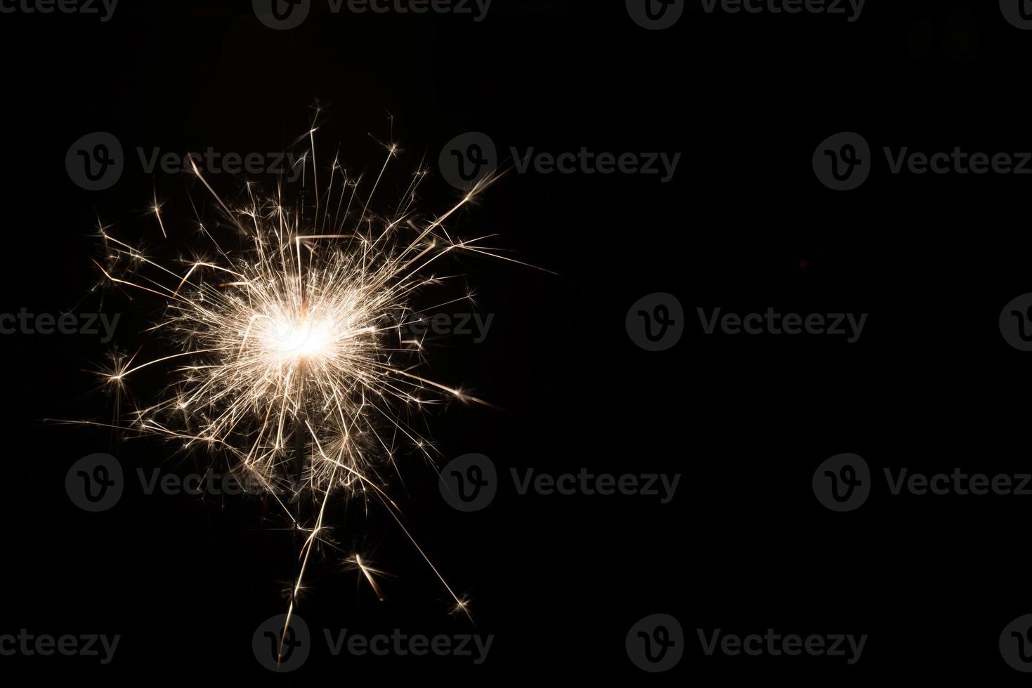 nieuwjaarsfeest sterretje op zwarte achtergrond foto