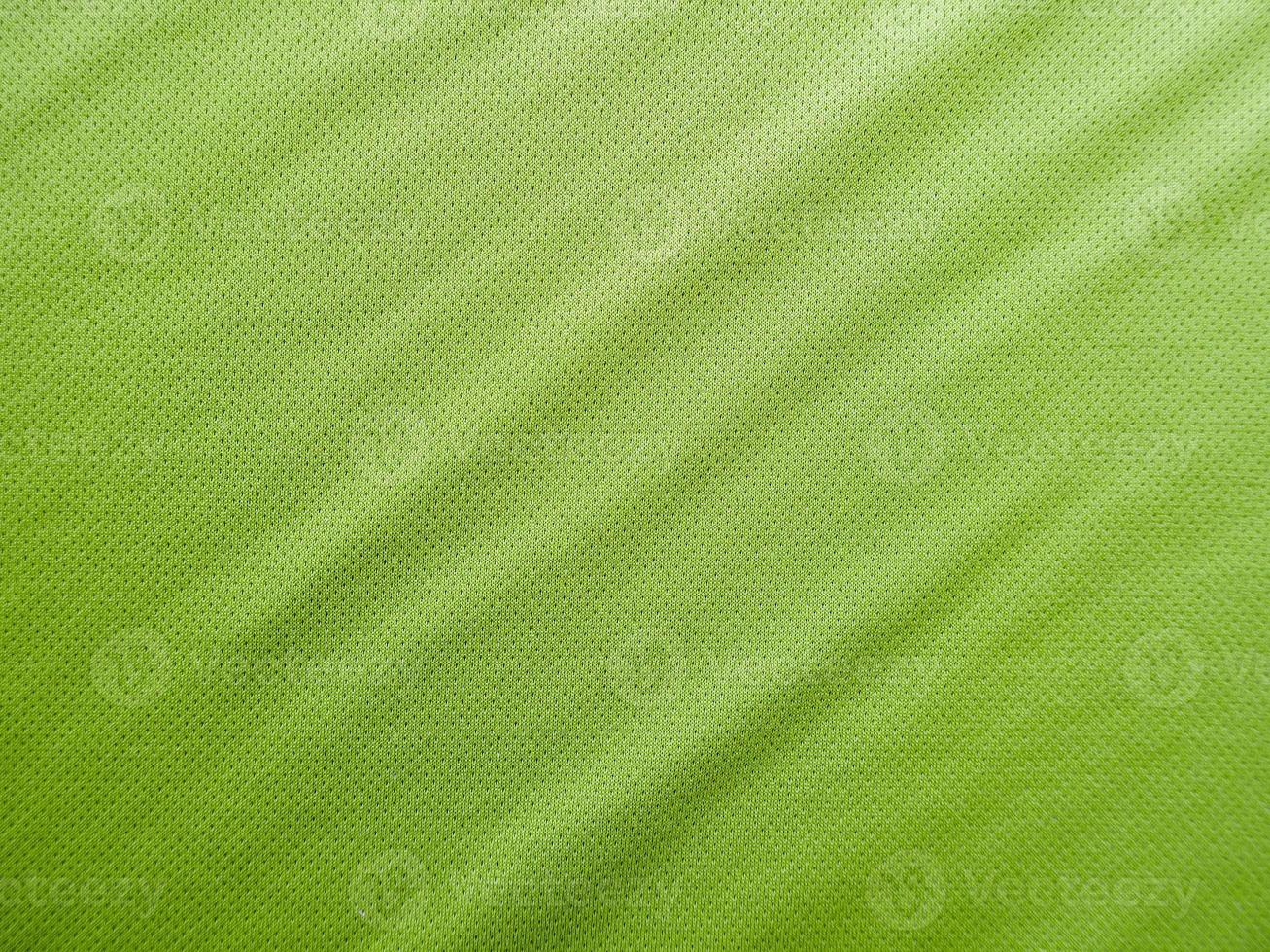 groene sportkleding stof jersey textuur foto